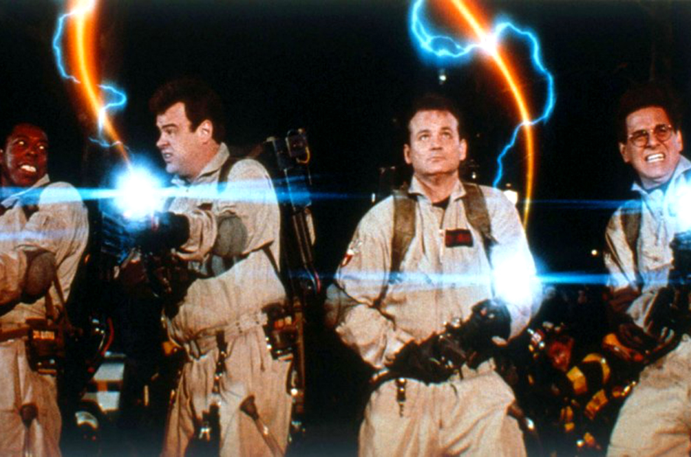 The Ghostbusters team capturing a paranormal creature