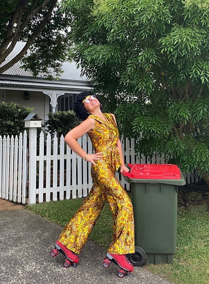 Facebook/Bin Isolation Outing Taking out the trash like a true hippie.