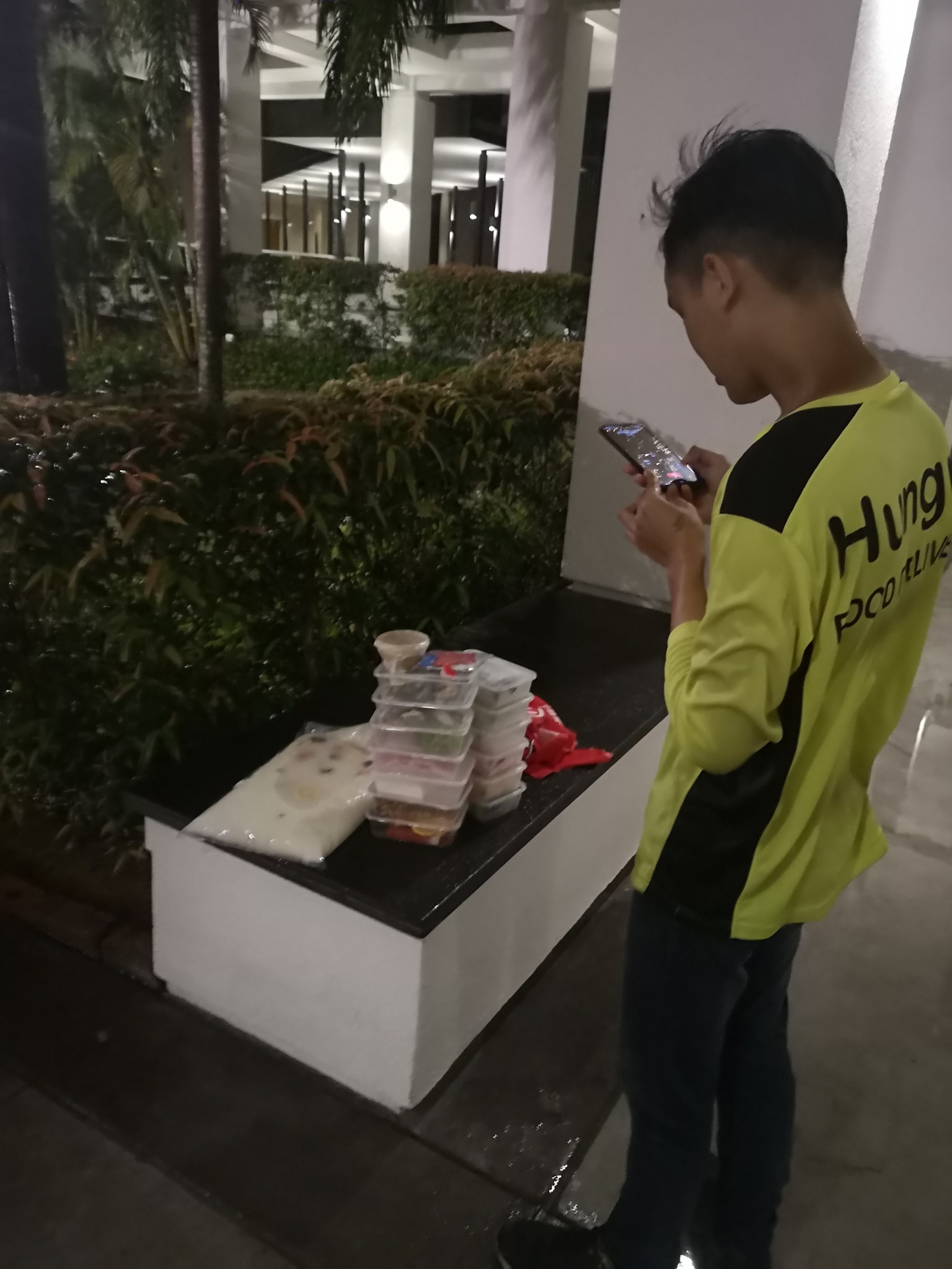 Facebook/Kian Kee Teh The poor rider was checking on the food.