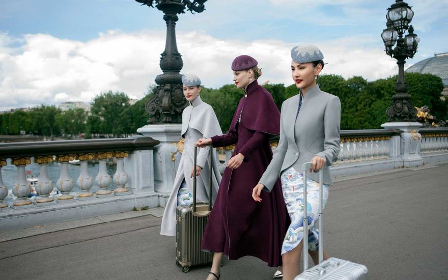Hainan Airlines Working it on and off the aircraft runway.