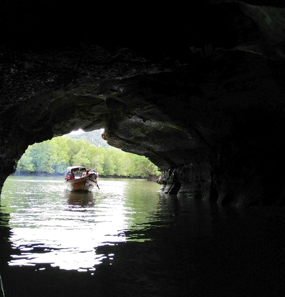 Dini Adilah Passing through the Crocodile Cave.