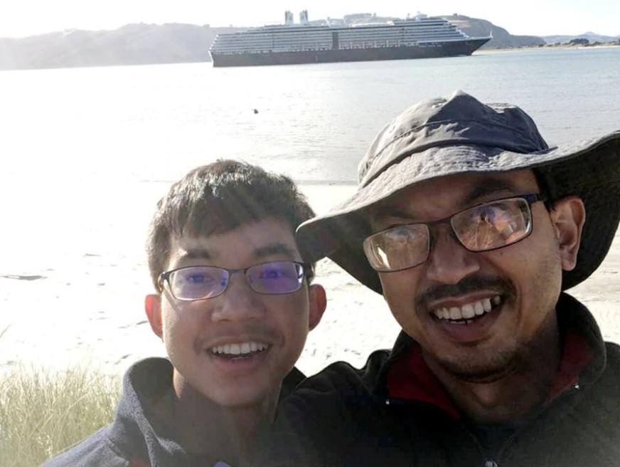 New Straits Times The late Haziq with his father who was also shot but survived.