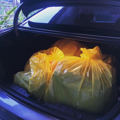 Patients’ luggages and items being wrapped in the yellow biohazard/ clinical waste plastic bag.